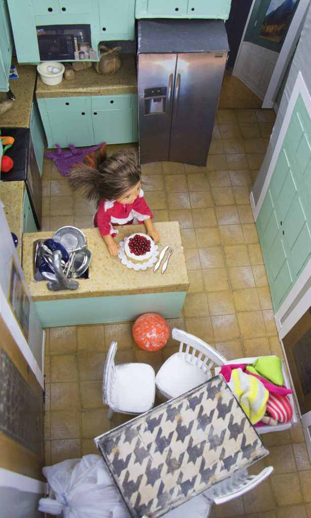 Diorama - Birdseye view showing kitchen and normal mess around